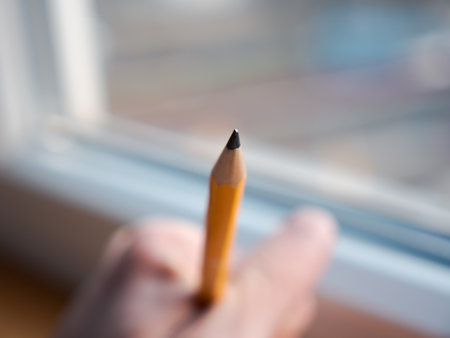 A selective focus closeup shot of a sharpened pencilの写真素材