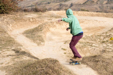 A skateboarder on the mountain - Extreme sport conceptの写真素材