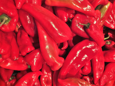 A closeup shot of many red chili peppers