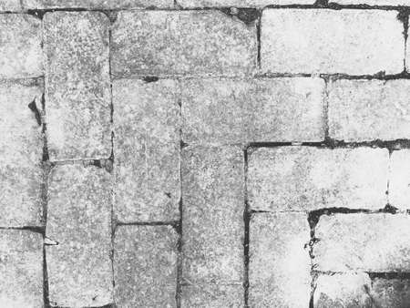 A closeup shot of gray stone bricks pattern background or wallpaper