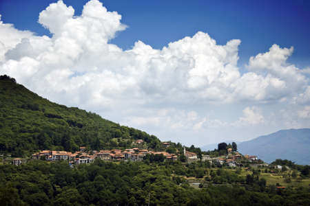 A mesmerizing shot of the rural houses among the beautiful landscapeの写真素材