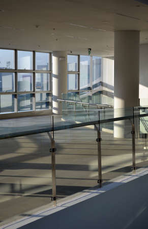 A vertical shot of an interior of a modern business buildingの写真素材