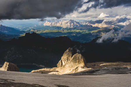 A beautiful scenery of green mountainous scenery during evening time in the North face of Marmolada, Italy, Dolomites.の写真素材