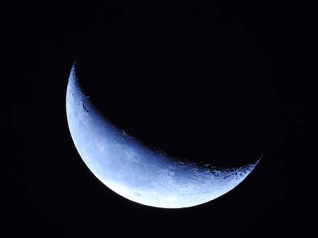 An aerial closeup shot of the beautiful moon at nightの写真素材