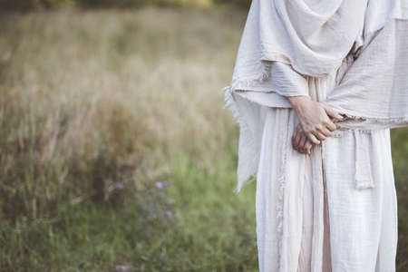 A closeup shot of a female wearing a biblical robe with a blurred backgroundの写真素材