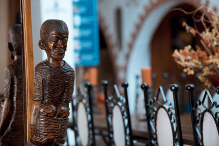 A closeup shot of wooden sculpting with a blurred backgroundの写真素材