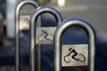 A closeup shot of silver bike stands to encourage people to ride rather than drive in New Zealandの写真素材