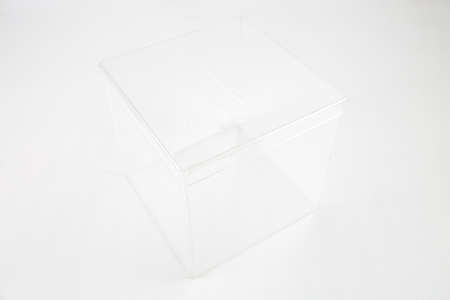 A closeup shot of a transparent plastic box isolated on a white backgroundの写真素材