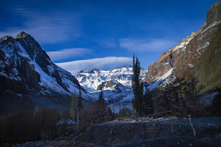 A beautiful view of the snow covered mountains under the clear blue sky