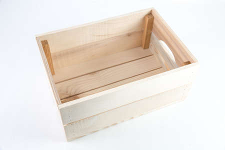 A high angle shot of an empty wooden box isolated on a white background