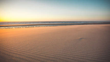 A beautiful view of the sands on the beach by the sea captured in Oostkapelle, Netherlands