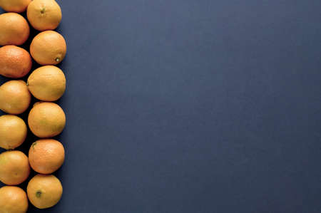 A blue surface with oranges on the side - great for background