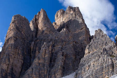 A low angle shot of the rocks in the Italian Alps under the skyの写真素材
