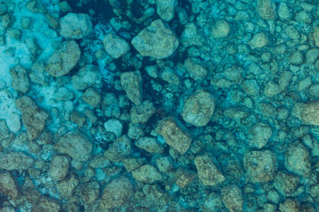 A high angle shot of beautiful rock formations in the Mediterranean sea - great for a cool...