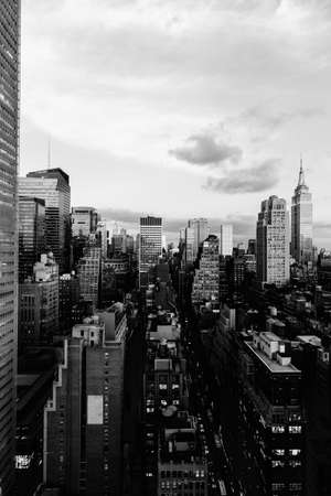 A vertical grey scale shot of the buildings and skyscrapers in New York City, United Statesの写真素材