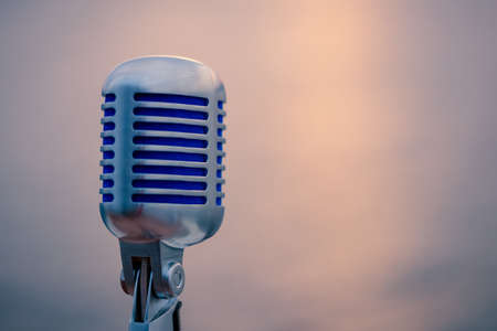 A closeup shot of a microphone ready to be used by a talented performerの写真素材