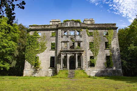 MUCKLOON, COUNTY MAYO, IRELAND - Aug 06, 2019: The ruined house and estate of aristocrat and wine merchant George Henry Moore who fed and saved his tenants from starvation during the Irish famineの写真素材
