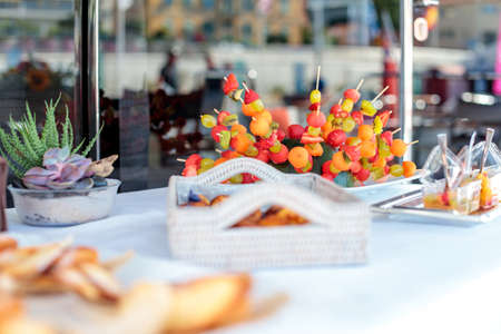 A selective focus shot of a delicious dessert setting on a table on a yachtの写真素材