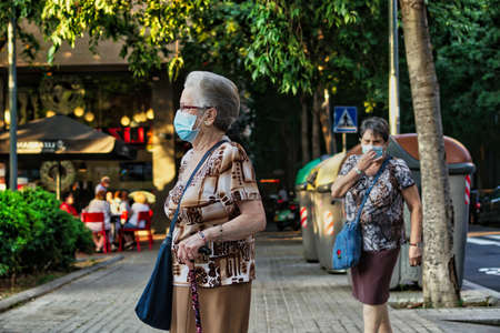 BARRCELONA, SPAIN - May 06, 2020: People on street during COVID-19 pandemic in Barcelona,Spain. Coronavirus Crisis.のeditorial素材