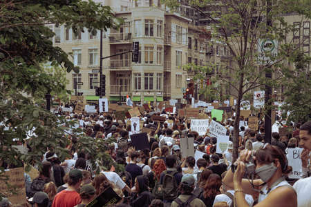 MONTREAL, CANADA - Jun 07, 2020: Montreal black lives matter protest for the killing of George Floyd. A peaceful march through downtown to push for systemic changeのeditorial素材