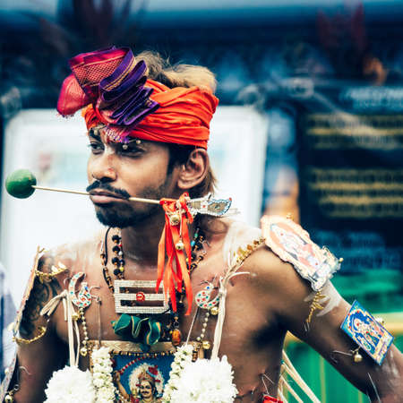SINGAPORE, SINGAPORE - Apr 23, 2016: A man with big piercing during Thaipusam religious Hindu Festival in Singaporeのeditorial素材