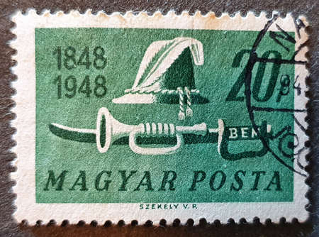 SOVATA, ROMANIA - Jul 02, 2020: an old postage stamp from Hungary 1948 with the image of celebrating...