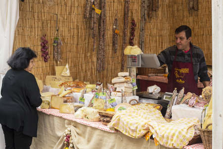 MELITELLO IN VAL DI CATANIA, ITALY - Oct 15, 2016: Stall selling cheese.  Sagrada della Mostarda e dell Fico dâIndia, a festival celebrating the prickly pear. Melitello in val di Catania Sicilyのeditorial素材