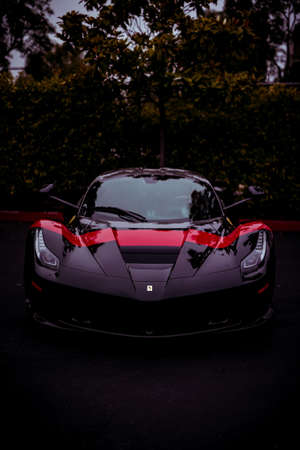 LOS ANGELES, UNITED STATES - Nov 13, 2019: Unique Laferrari parked on the street with red stripe...
