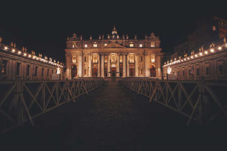 A wide shot of a pathway leading to Saint Peter's Basilica at night timeのeditorial素材