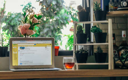 JAKARTA, INDONESIA - Jun 04, 2017: working coffee vibes by the window with some tea