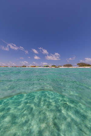 A vertical low angle shot of the ocean in Bonaire, Caribbeanのeditorial素材