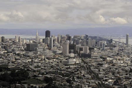 San Francisco skyline in 2009 with clouds, hills, part of Bay Bridge