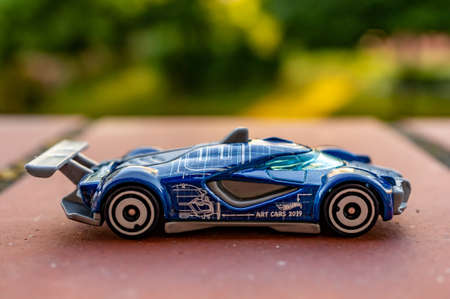 POZNAN, POLAND - Jul 01, 2020: Blue Mattel Hot Wheels futuristic toy race car