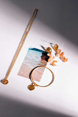 BIRMINGHAM, UNITED KINGDOM - Feb 25, 2019: A vertical closeup high angle shot of brand accessories on white backgroundのeditorial素材