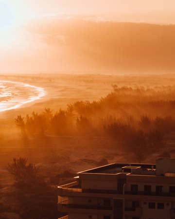 A high angle shot of a breathtaking crispy golden sunset