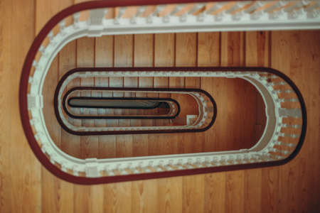 A spiral stairecase in an locative appartmentの写真素材
