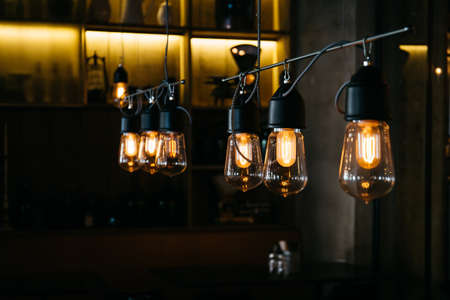 The beautiful shot of the lamps inside a coffee house