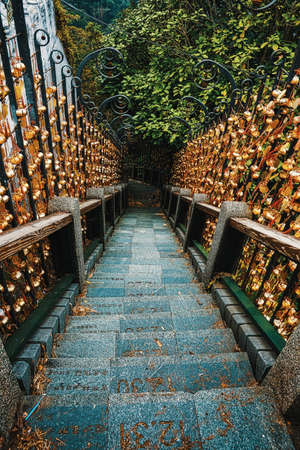 SUN MOON LAKE, TAIWAN - Dec 05, 2019: A vertical shot of a stairway going down the beautiful...