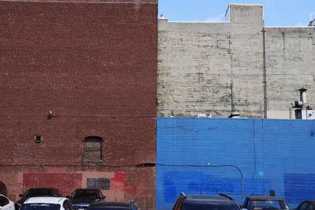 PORTLAND, UNITED STATES - Jul 26, 2019: The brick walls painted in white, blue and brown behind a...