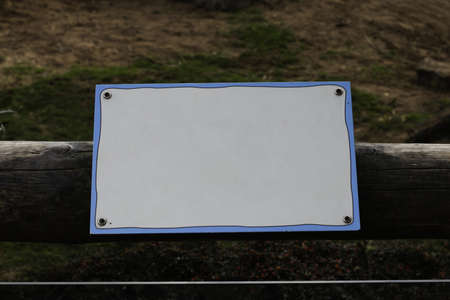 A blank page on a wooden fence - with empty space for your text