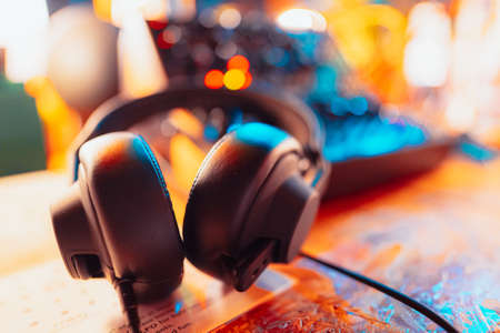 A selective focus shot of black wired headphonesの写真素材