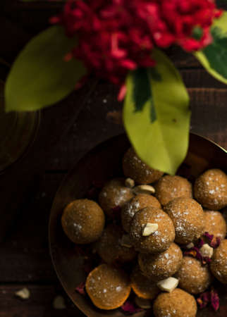 BANGALORE, INDIA - Dec 24, 2019: A vertical high angle shot of a traditional Indian sweet made of wheat flour and jaggeryの写真素材