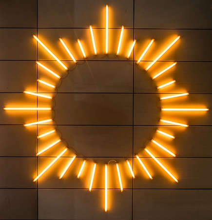 A closeup shot of lights in a circular shape on the wallの写真素材