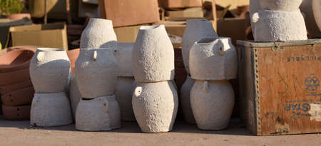 ceramic jars and plates in ceramics workshop