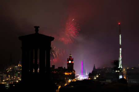 A low angle shot of the nighttime colorful fireworks in Londonの写真素材