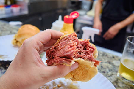 A selective focus shot of a delicious fresh ham sandwichの写真素材