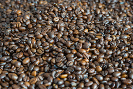 A high angle of a surface covered with coffee beansの写真素材