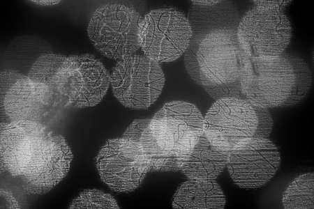 Photos created by adding drops of oil into water and then creating some texture using different elements.の写真素材