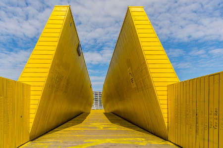 ROTTERDAM, NETHERLANDS - Sep 16, 2019: view on the Luchtsingel, a crowdfunded elevated wooden yellow foot bridge, connecting park pompenburg, hofplein and dakakker. Travel and tourism.のeditorial素材