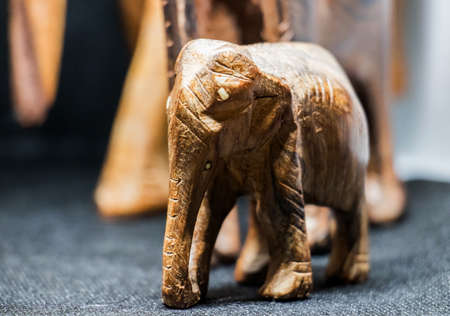 A closeup shot of an Indian elephant sculpture with a blurry backgroundの写真素材